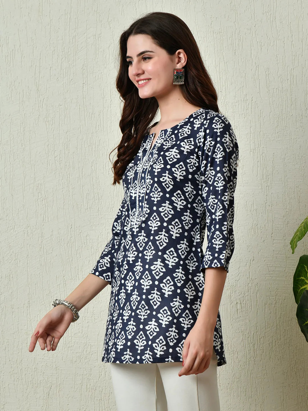 Women Stylish Blue Cotton Short Kurti With Elegant Print