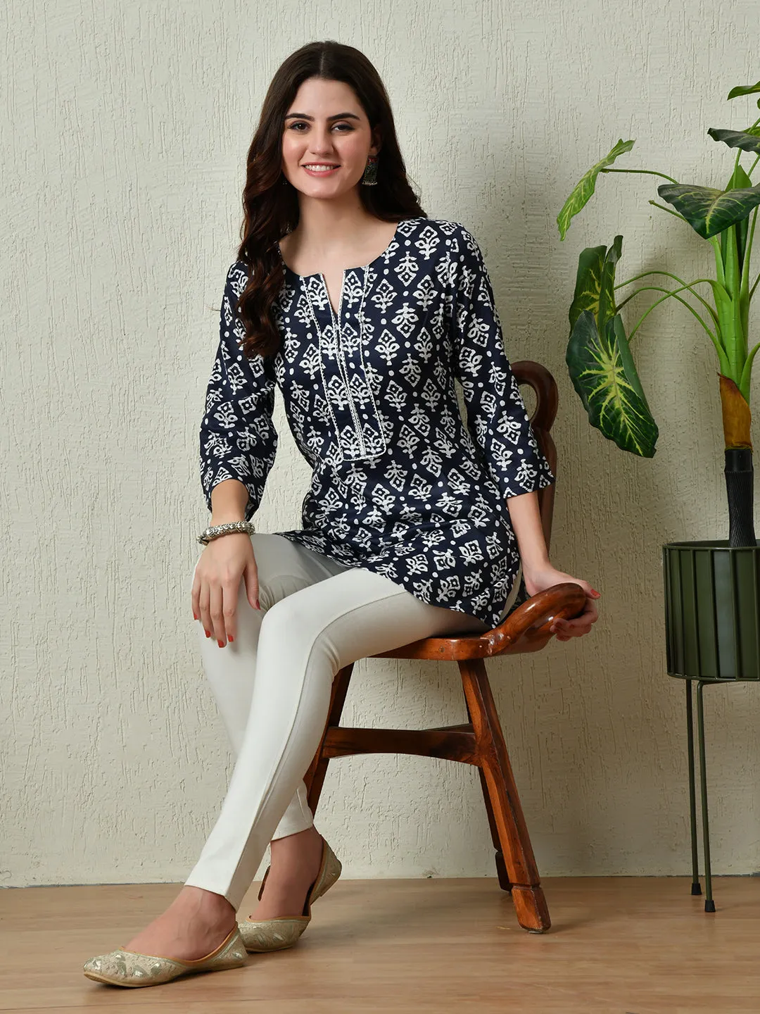 Women Stylish Blue Cotton Short Kurti With Elegant Print